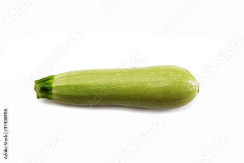 natural fruit a green zucchini on a white background