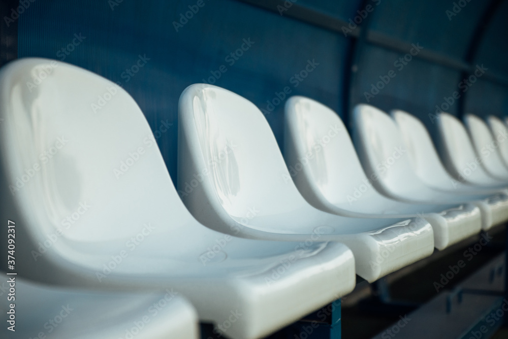 Fototapeta premium Coach and reserve benches in a soccer field