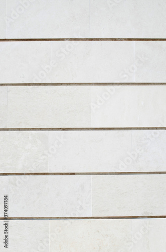 New white stone slabs on wall closeup