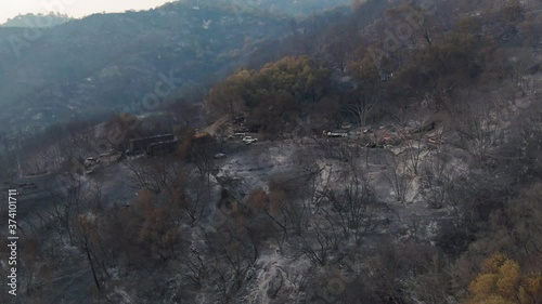 Napa, California, USA. 22 August 2020. Aerial: Burnt out cars, buildings & forest. LNU Lightning Complex Fire that ravaged the Napa, Sonoma, Lake and Solano counties. photo