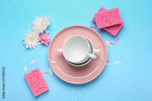Composition with clean tableware on color background