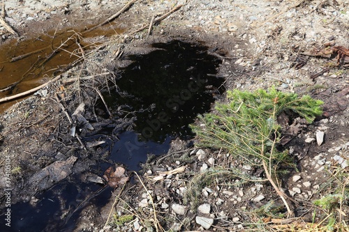 Motor oil spill - soil pollution