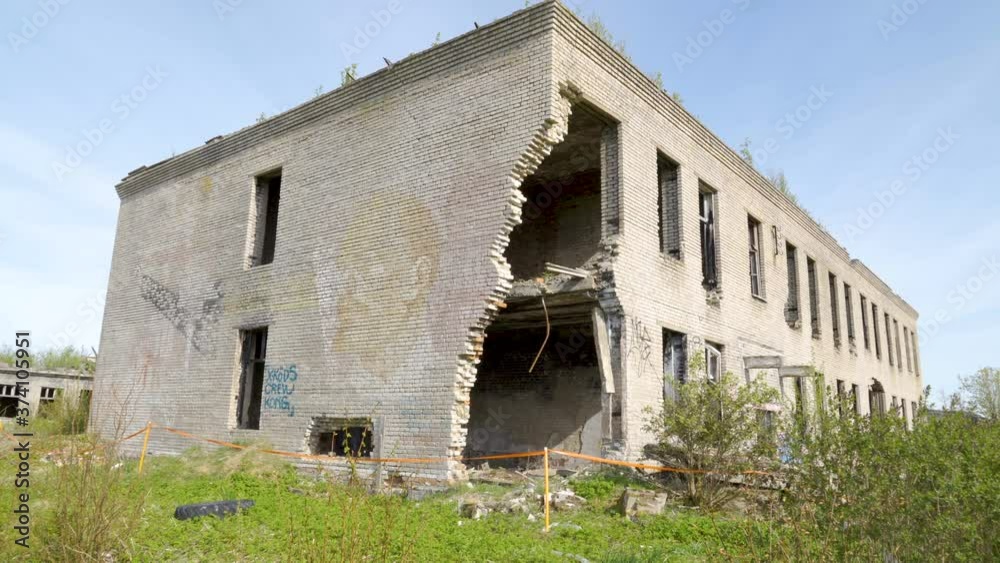 The look of the big broken and ruined concrete house