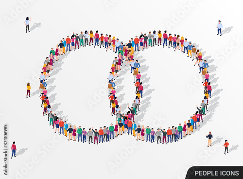 A large group of people in the form of two joined circles.