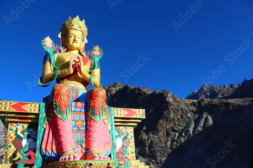 Buddha statue at Buddhist monastery Diskit, Ladakh, India. Golden Buddha, Tibet photo