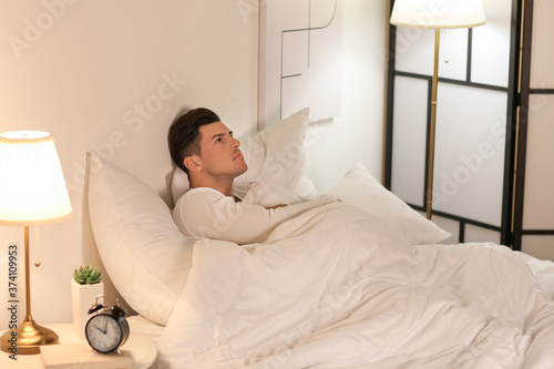 Young man suffering from in...