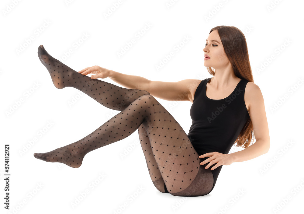 Beautiful young woman in tights on white background Stock Photo