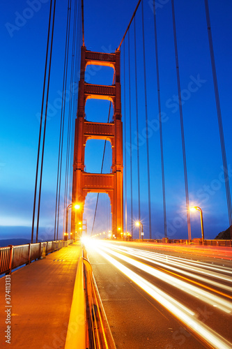 Portrait shot of support of the world famous Golden Gate Bridge at sunrise