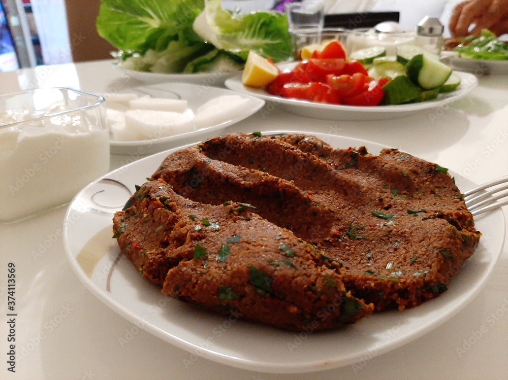 delicious urfa cigkofte on the plate delicious urfa cigkofte on the plate