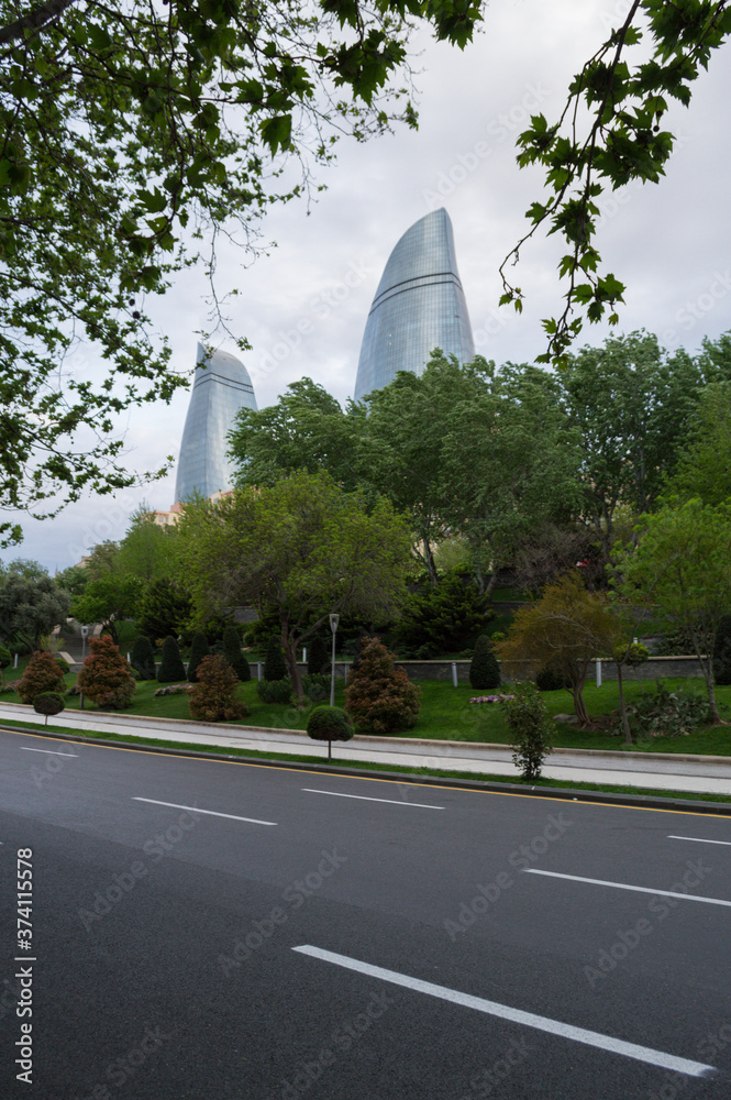 Flame Towers Skyscrapers and Trees in Baku, Azerbaijan