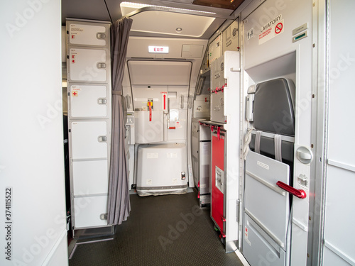 Billede på lærred Aircraft aft galley with full of storage unit