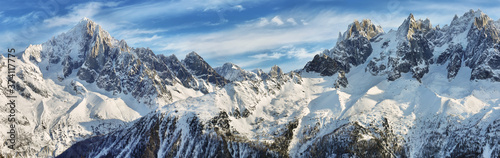Panoramic view of Montblanc peak and Grandes Jorasses from Cormayeur ski slopes photo