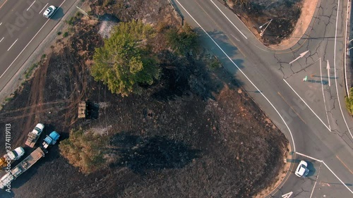 Vacaville, California, USA. 22 August 2020. Freeway traffic and burnt hills on the Interstate 80. LNU Lightning Complex Fire that ravaged the Napa, Sonoma, Lake and Solano counties. photo