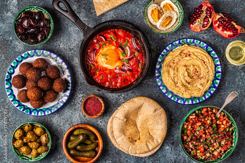 Falafel  hummus  shakshuka  Israeli salad - traditional dishes of Israeli cuisine.