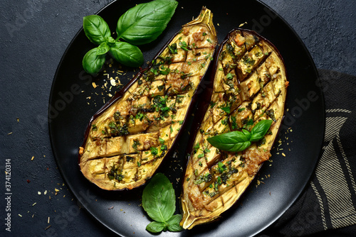 Grilled spicy eggplants. Top view with copy space.