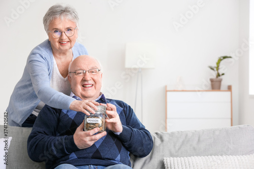 Senior couple with savings ...