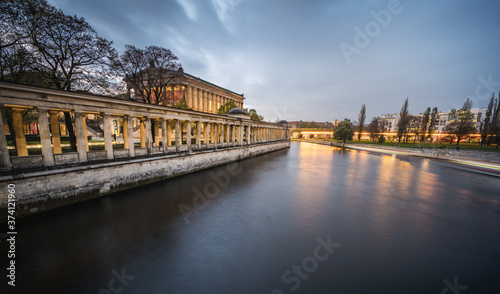 Scenic view of Twilight Alte Nationalgalerie by river against sky in Berlin Germany
