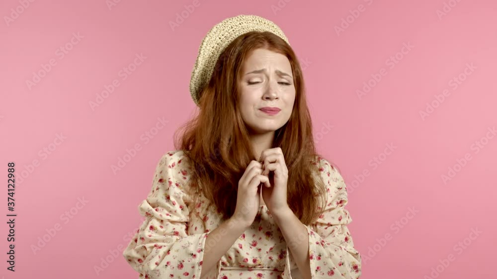 Close up of young scared girl shouting loud isolated over pink background. Stressed and depressed woman trying to get attention. Concept of help and safe Close up of young scared girl shouting loud isolated over pink background. Stressed and depressed woman trying to get attention. Concept of help and safe