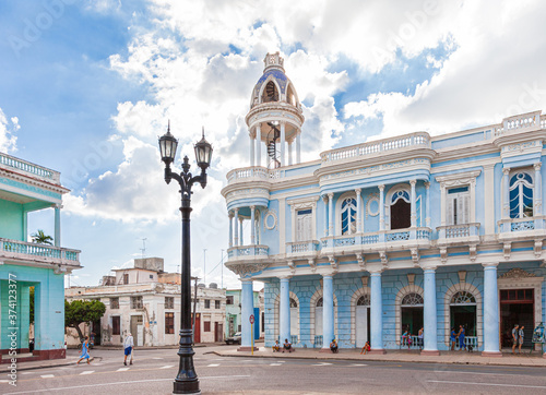 Cienfuegos, Cuba-October 13, 2016. Palace Ferrer, estate located at central square, park called Parque Jose Marti in historical centre of Cienfuegos south coast town with colonial-era buildings.