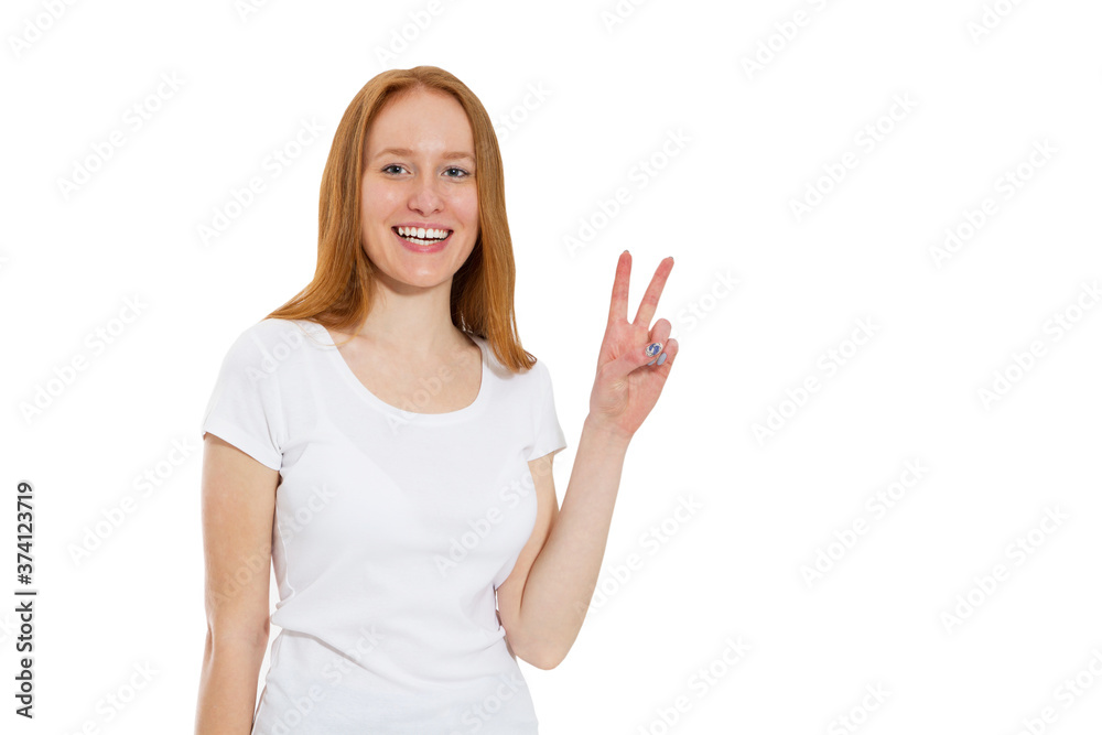 Young red-head woman showing two fingers, positive or peace gesture, on white, Beautiful Girl Show Victory Sign Young red-head woman showing two fingers, positive or peace gesture, on white, Beautiful Girl Show Victory Sign