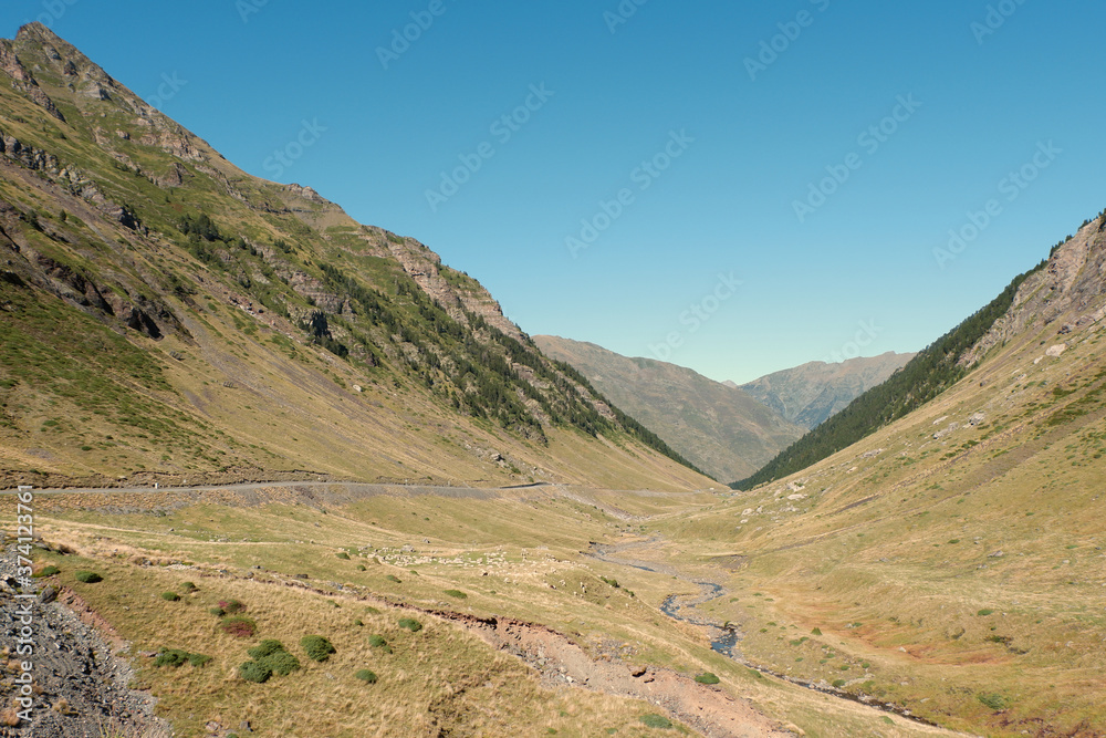 Dry mountain bend on the border between France and Spain. Beautiful autumnal landscape. Dry mountain bend on the border between France and Spain. Beautiful autumnal landscape.