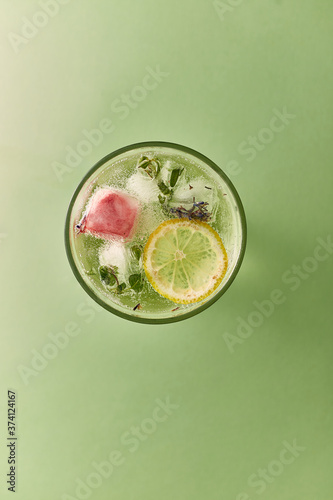 champagne with lemon herbs and ice