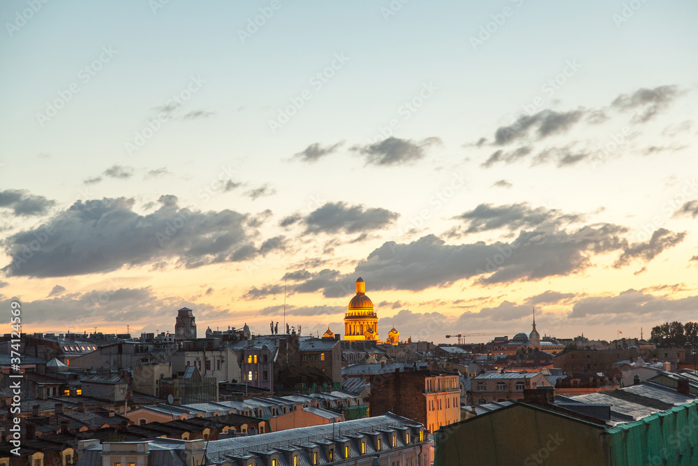 Saint Petersburg rooftop cityscape in time of sunset with view on Saint Isaac's cathedral