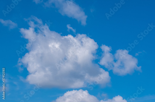 blue sky background with white clouds © Nadezhda Kozhedub