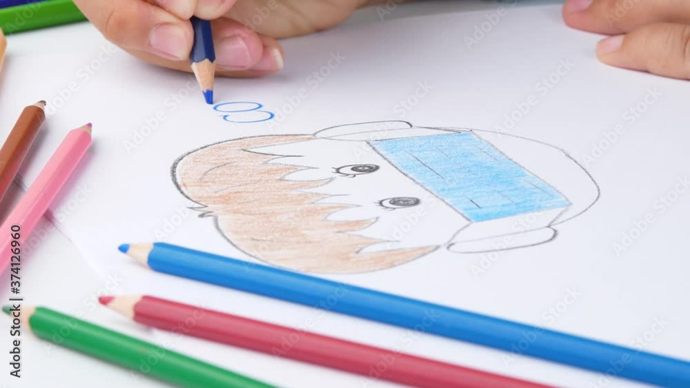 Close-up of a hand painted with color pencil, depiction of a man wearing a mask against the coronavirus. Close-up of a hand painted with color pencil, depiction of a man wearing a mask against the coronavirus.
