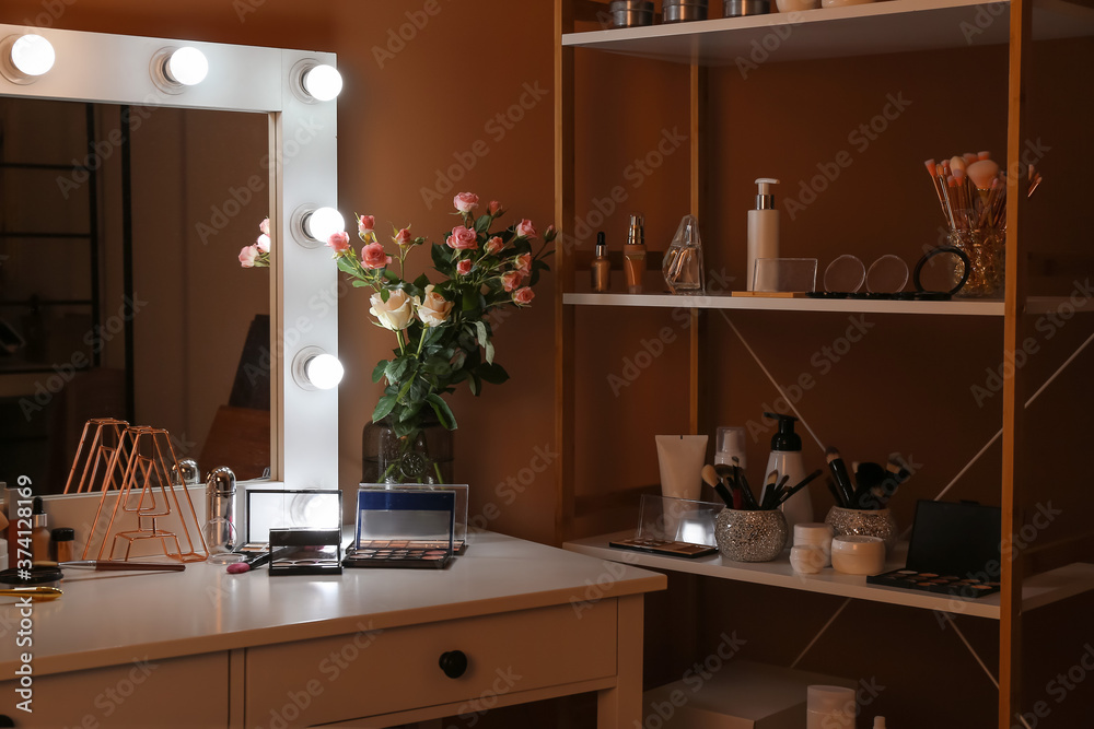 Fototapeta premium Stylish interior of modern dressing room at night