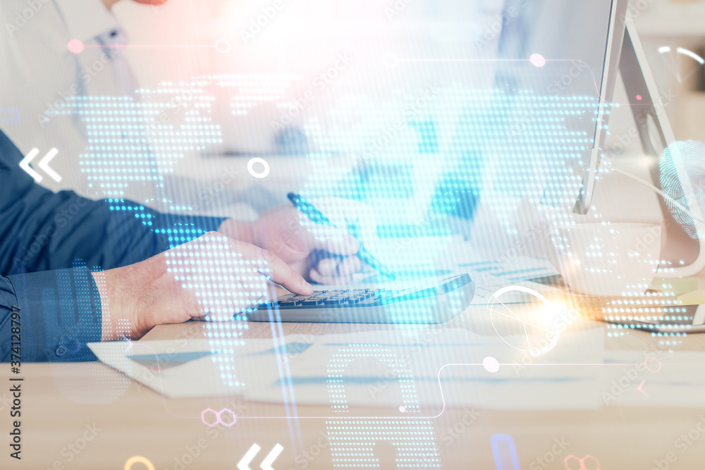 Double exposure of world map hologram with man working on computer on background. Concept of worldwideweb. Double exposure of world map hologram with man working on computer on background. Concept of worldwideweb.