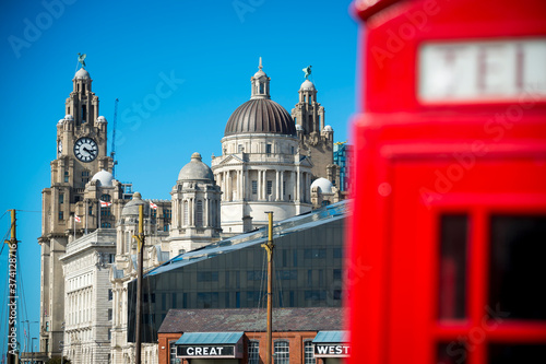 Fototapeta View of Liverpool's iconic grand old waterfront buildings with a classic red bri
