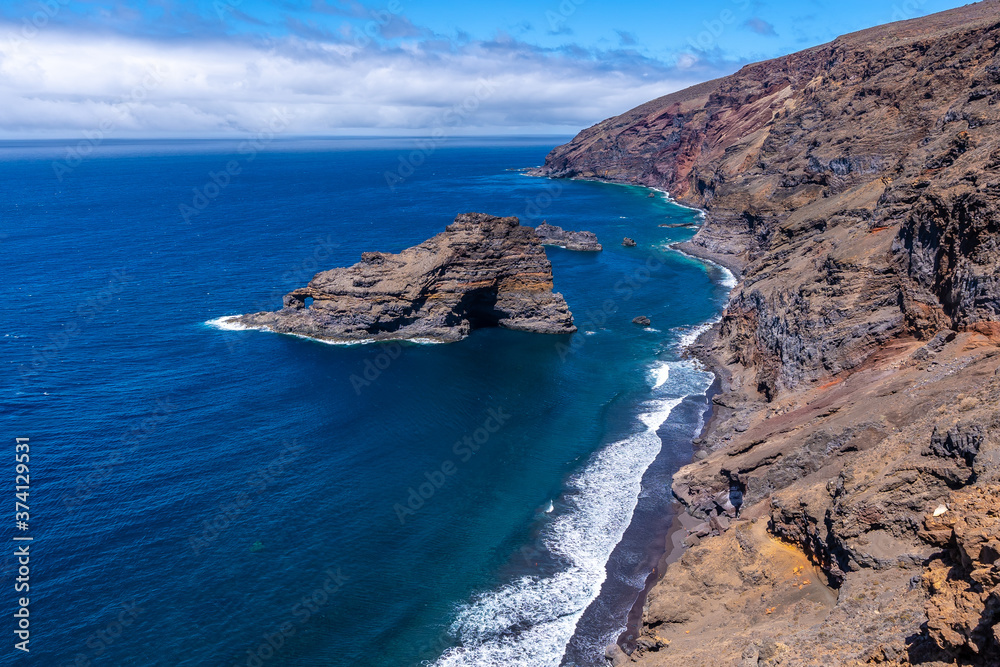Fototapeta premium The beautiful black sand beach of Bujaren from above in the north of La Palma, Canary Islands. Spain