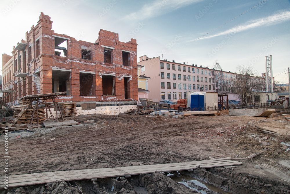 Small apartment house construction site