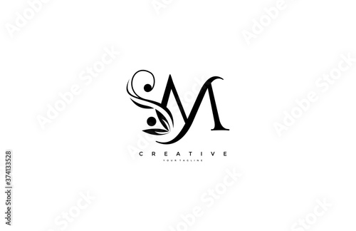 Flourishes letter M luxury beauty monogram logo