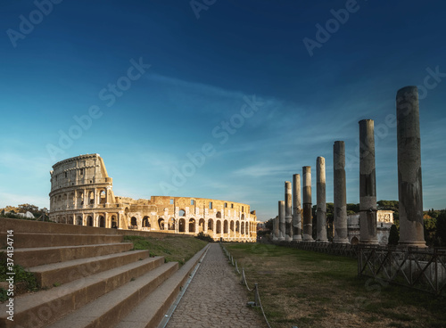 Colosseum in Rome and sunset sun, Italy