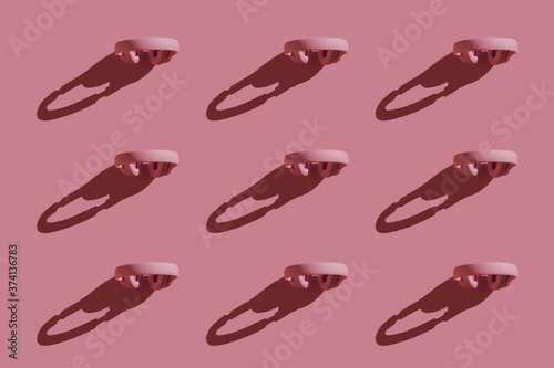 Imagen de auriculares para oir musica color rosa pastel 