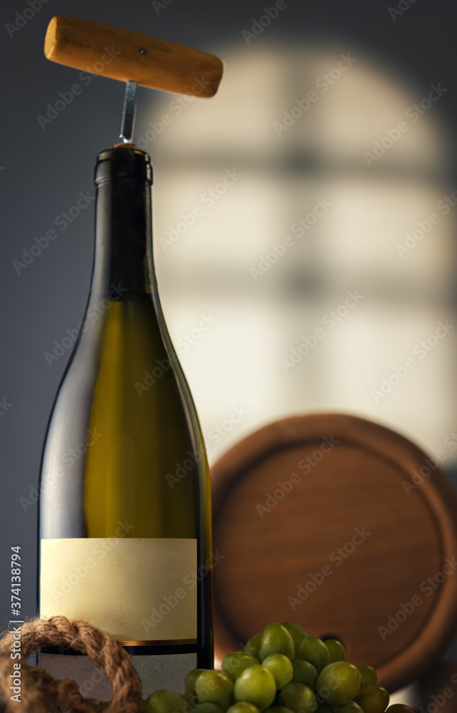 Obraz premium Wine bottle with a corkscrew in the cellar
