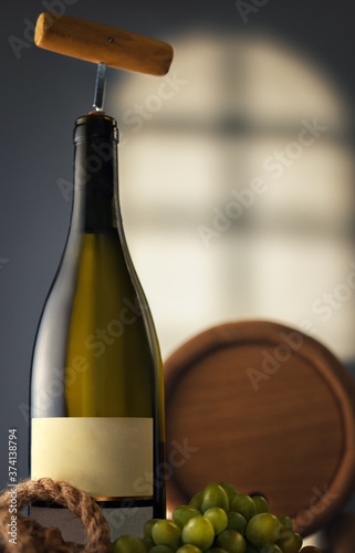 Fototapeta Naklejka Na Ścianę i Meble -  Wine bottle with a corkscrew in the cellar