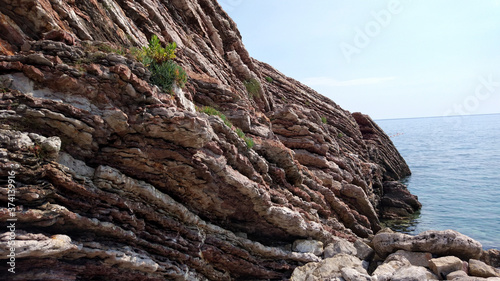 Layered cliffs on the adriatic coast (Montenegro, Budva)