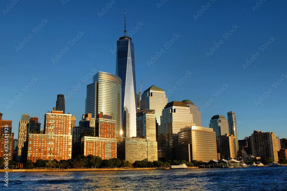 The Manhattan skyline seen form the Hudson River at sunset