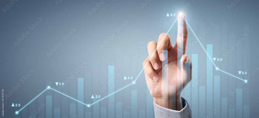 Businessman plan graph growth and increase of chart positive indicators in his business Businessman plan graph growth and increase of chart positive indicators in his business