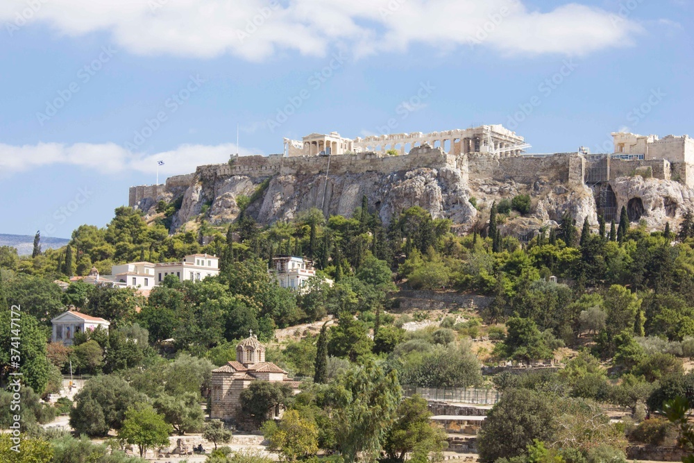 view from below of the Acropolis hill in Athens, Greece