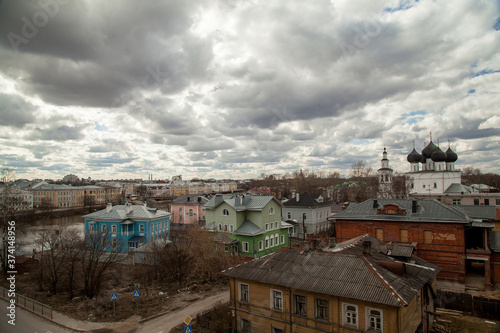 Russian autumn townscape with bright Cottages