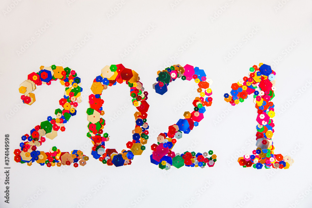 2021 made of confetti on white background. New Year idea 2021 made of confetti on white background. New Year idea