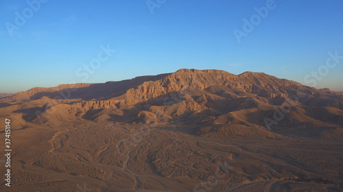 Luxor Egypt panorama view riding hot air balloon over valley of the king sunrise aerial view video