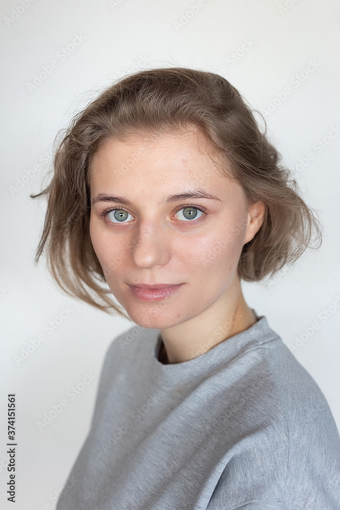 portrait of caucasian woman with clean skin and short hair posing in ...