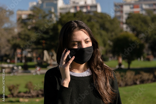 Social media concept, woman with mobile smartphone. covid 19  photo