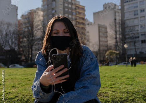 Social media concept, woman with mobile smartphone. covid 19  photo