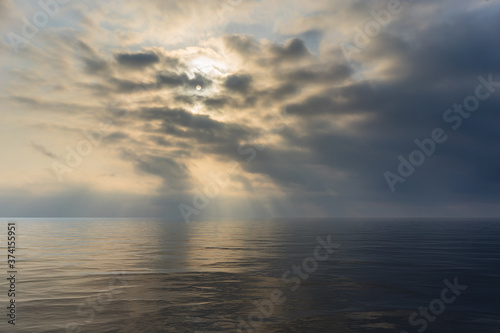 Seascape in cloudy and foggy weather